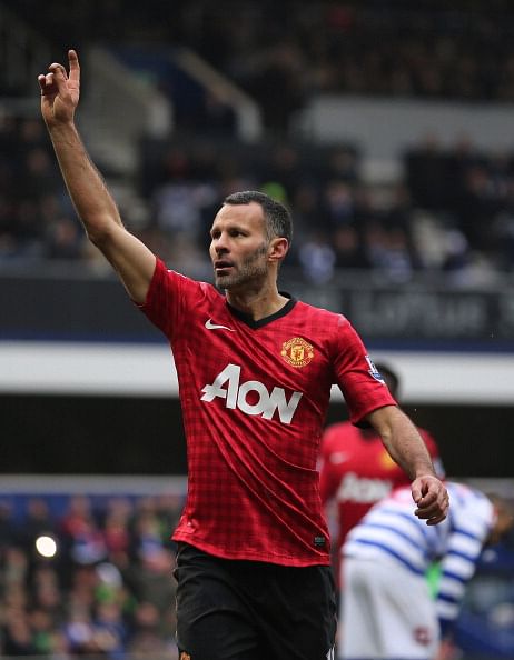 LONDON, ENGLAND - FEBRUARY 23: Ryan Giggs of Manchester United celebrates a goal during the Barclays Premier League match between Queens Park Rangers and Manchester United